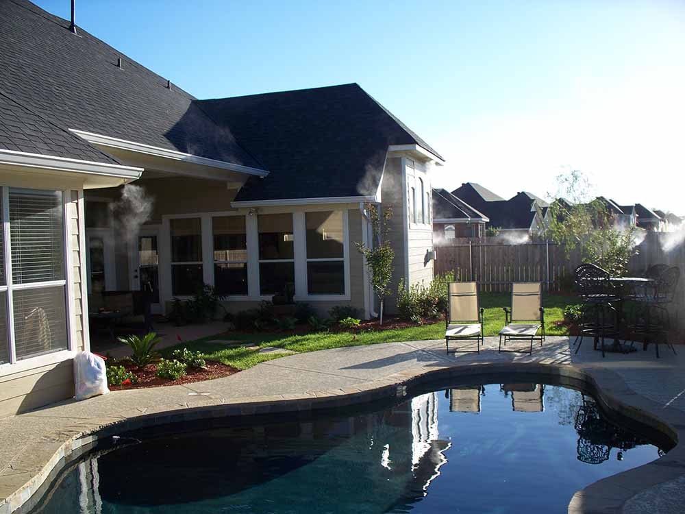 Backyard pool patio with misting system